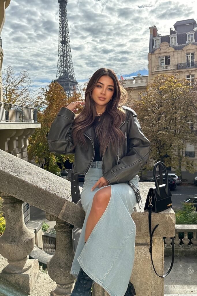 Black Leather Jacket + Black Top + Light Blue Denim Maxi Skirt + Black Chunky Boots + Black Structured Bag