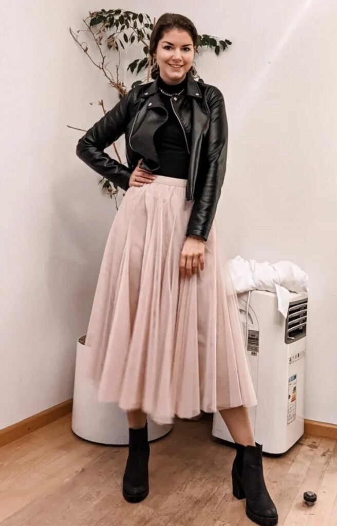 Black Leather Jacket + Black Turtleneck + Blush Tulle Midi Skirt + Black Ankle Boots