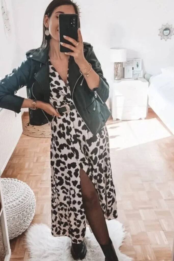 Black Leather Jacket + Black and White Leopard Print Wrap Dress with Slit + Black Tights + Black Lug Sole Ankle Boots
