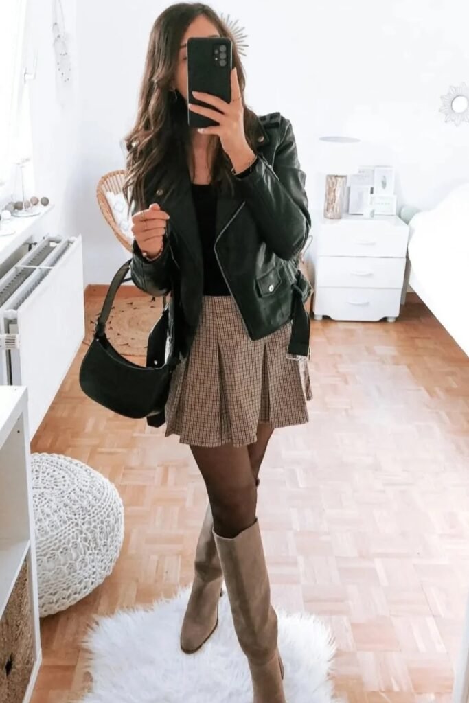 Black Leather Jacket + Plaid Pleated Mini Skirt + Black Tights + Taupe Knee-High Boots