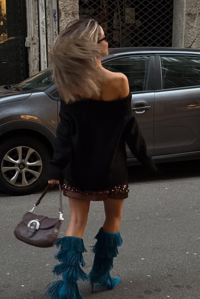 Black Off-Shoulder Sweater + Sequin Mini Skirt + Teal Fringe Boots