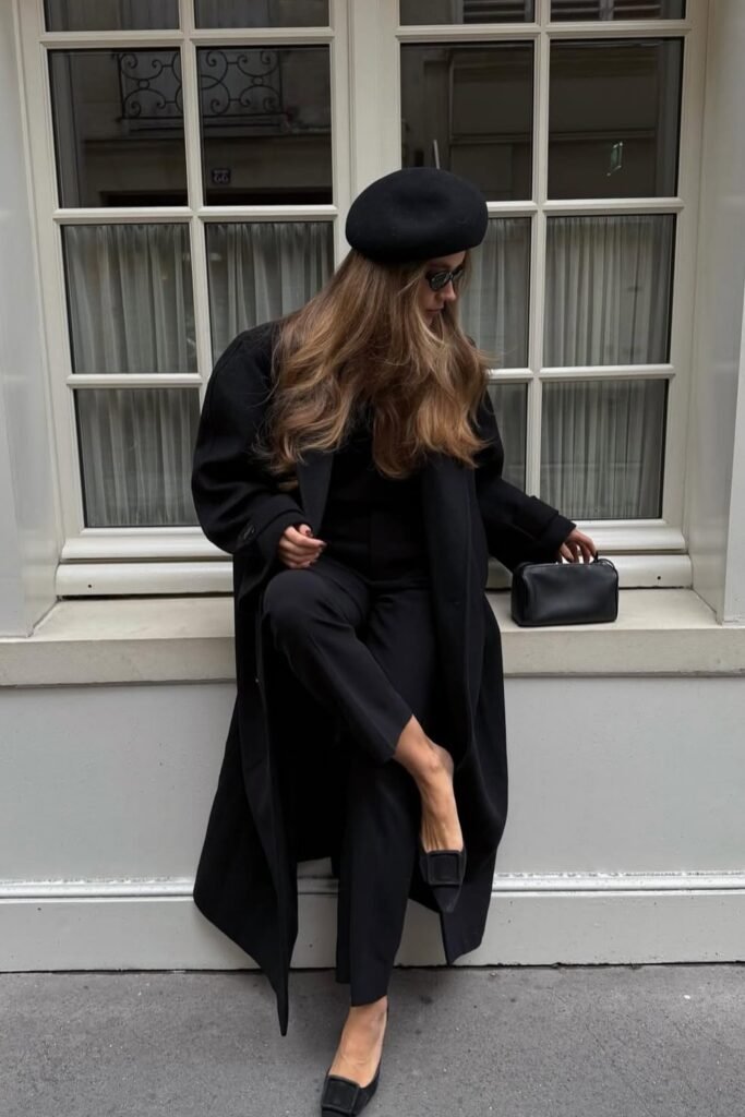 Black Oversized Coat + Black Top + Black Trousers + Black Beret + Black Buckled Flats