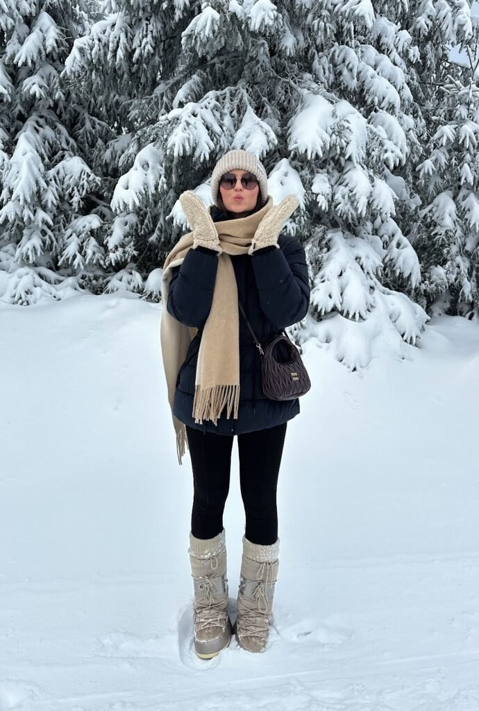 Black Puffer Jacket + Beige Knit Scarf + Black Leggings