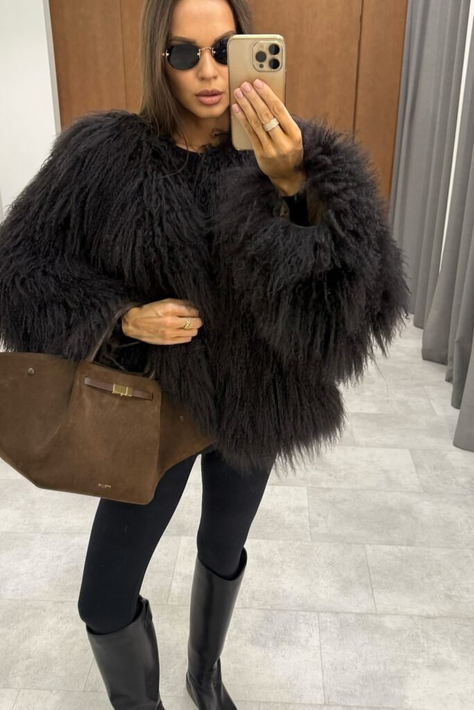 Black Shaggy/Mongolian Fur Jacket + Black Ribbed Leggings + Black Knee-High Boots + Brown Suede Handbag
