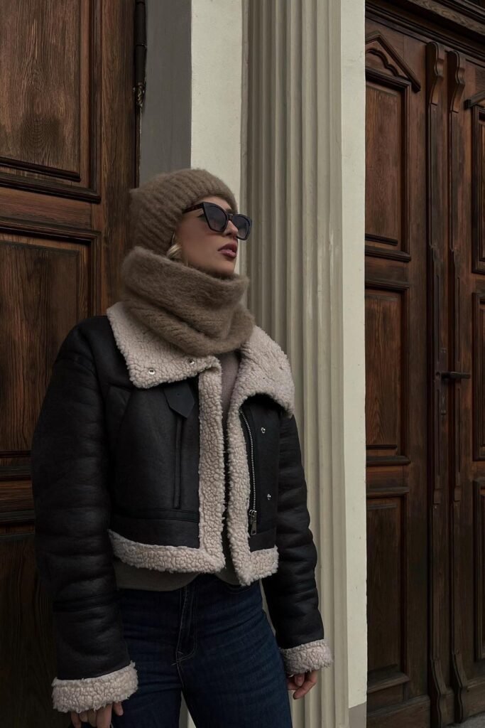 Black and Beige Shearling Aviator Jacket + Beige Turtleneck + Dark Wash Skinny Jeans + Beige Knit Scarf and Beanie