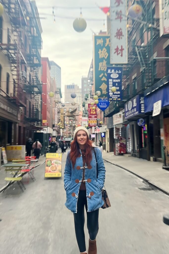 Blue Denim Duffle Coat + Brown Turtleneck + Black Leggings + Brown Ankle Boots + White Beanie