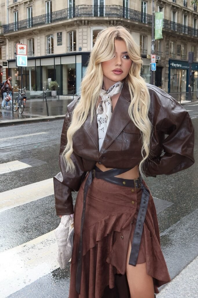Brown Cropped Leather Jacket + Brown Layered Wrap Skirt with Studded Straps + White Silk Scarf