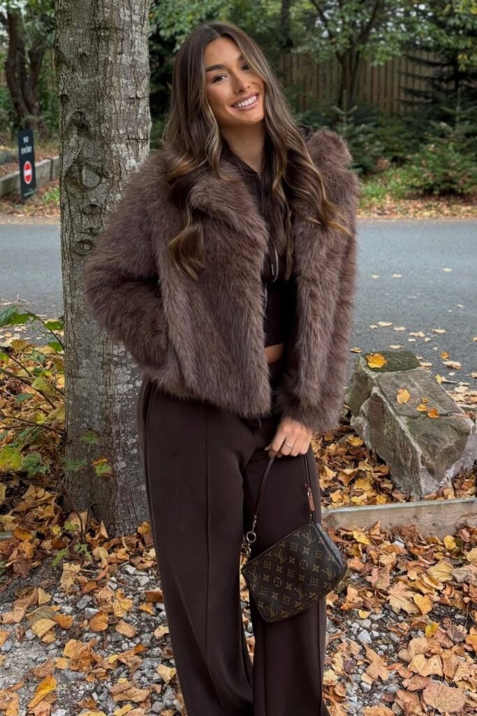 Brown Faux Fur Jacket + Brown Cropped Hoodie + Brown Wide-Leg Sweatpants + Monogram Shoulder Bag