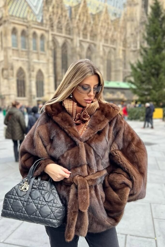 Brown Fur Coat with Tie Belt + Brown Printed Scarf + Dark Sunglasses + Black Quilted Handbag