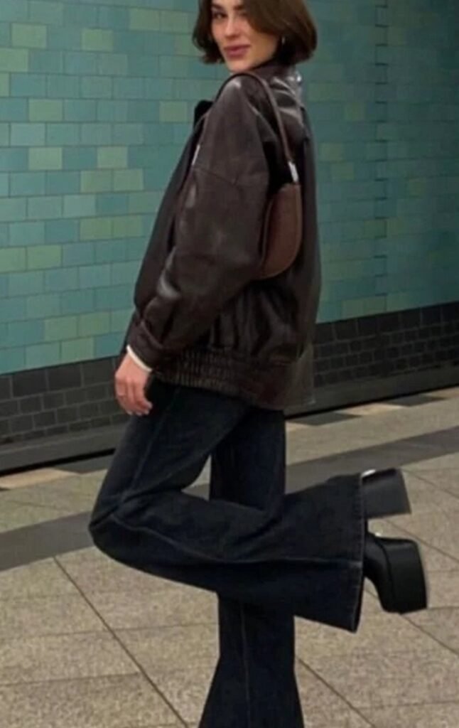 Brown Leather Bomber Jacket + Black Flared Jeans + Black Platform Boots + Brown Shoulder Bag
