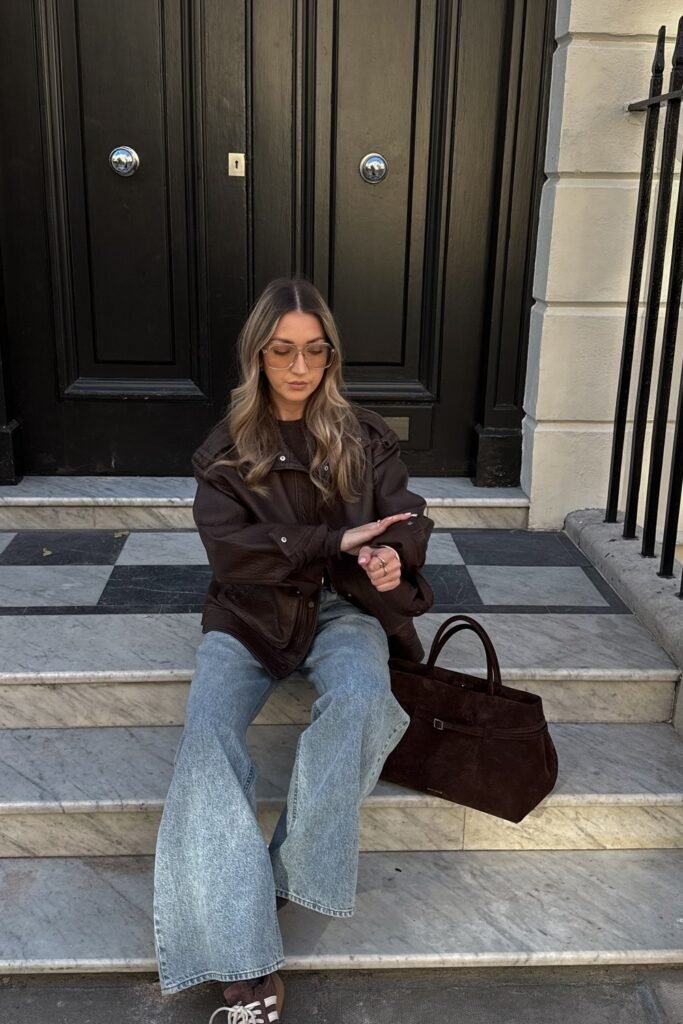 Brown Leather Bomber Jacket + Light Wash Baggy Jeans + Adidas Sneakers