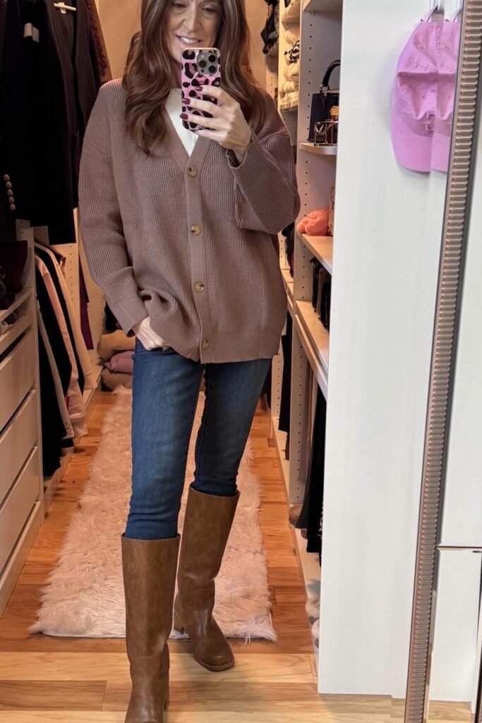 Brown Oversized Cardigan + White Top + Dark Blue Skinny Jeans + Brown Knee-High Boots