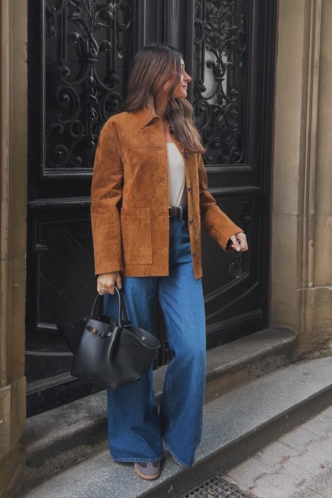 Brown Suede Jacket + White Top + Dark Wash Wide-Leg Jeans + Black Tote Bag