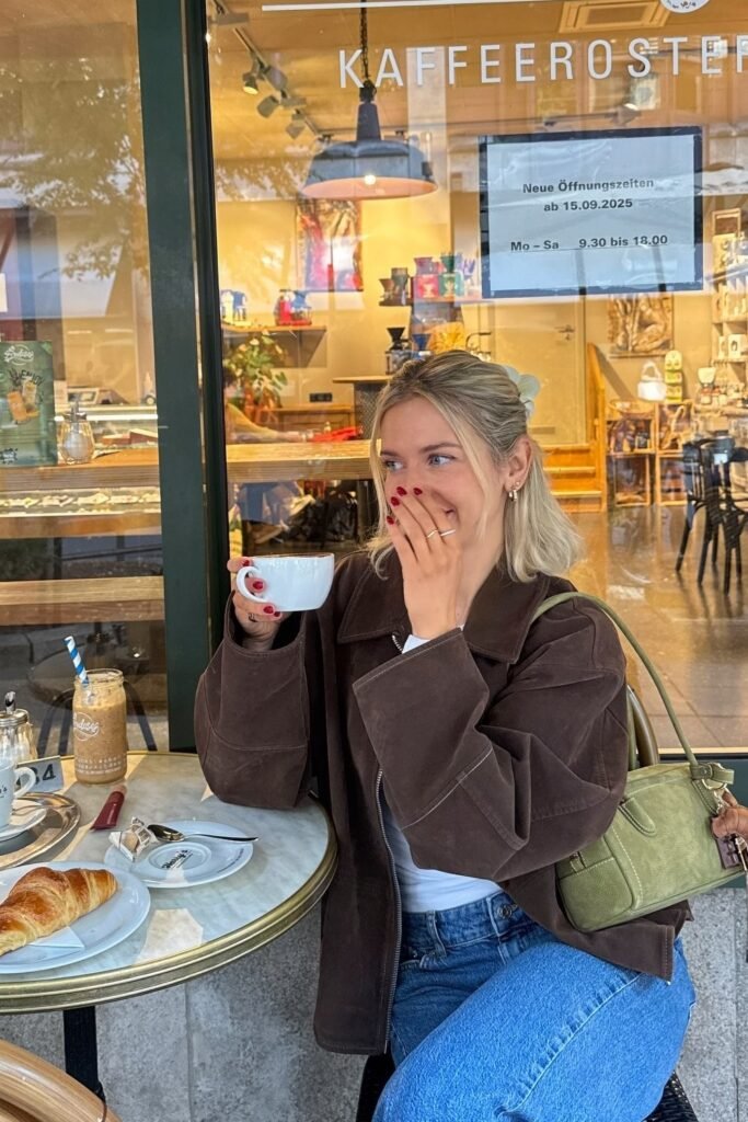 Brown Suede Zip-Up Jacket + White Top + Blue Jeans + Olive Suede Mini Bag