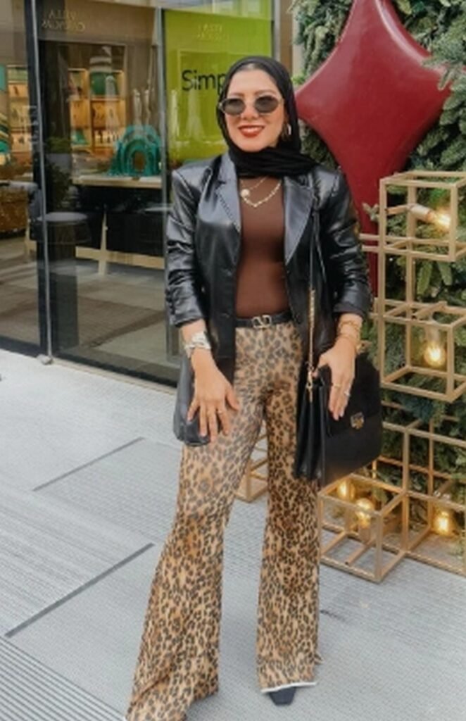 Brown Top + Black Leather Blazer + Leopard Print Flared Pants + Black Hijab + Black Handbag