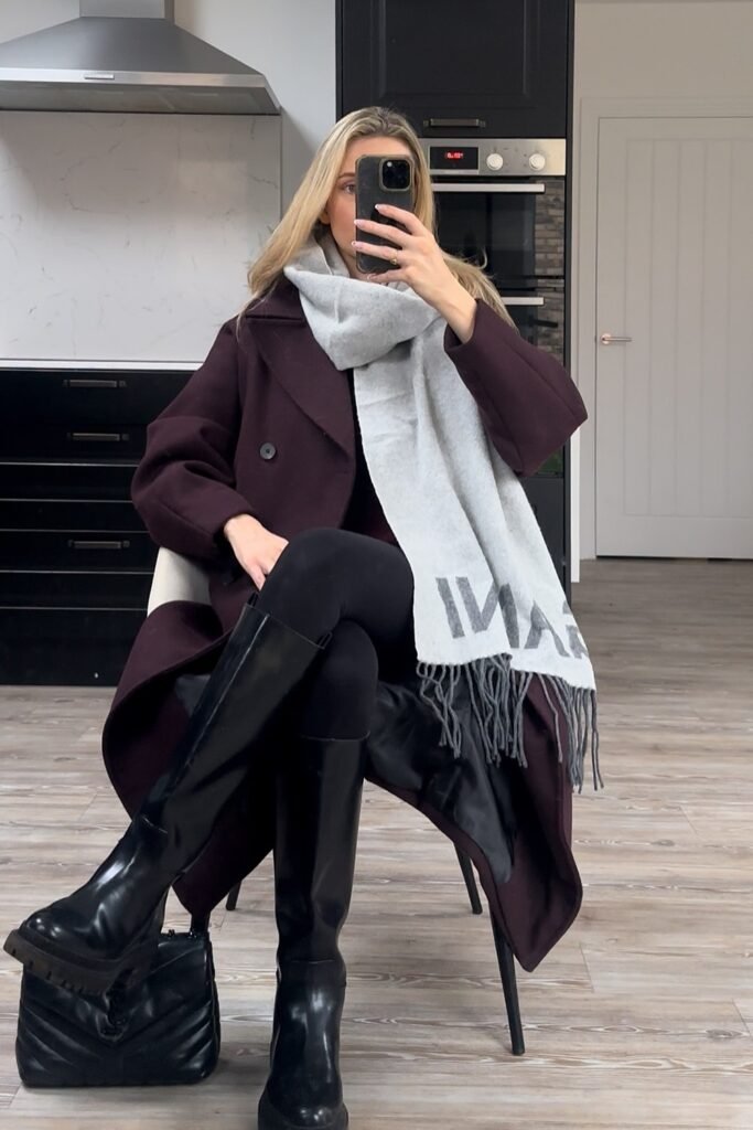 Burgundy Coat + Grey Logo Scarf + Black Leggings + Black Knee-High Boots