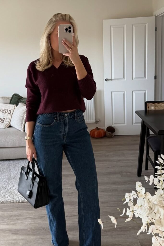 Burgundy V-Neck Sweater + Wide-Leg Blue Jeans + Black Mini Handbag
