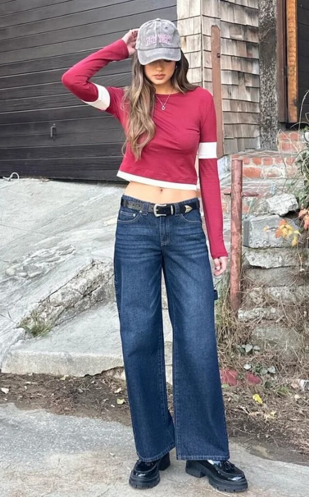 Burgundy and White Cropped Long Sleeve Top + Dark Wash Wide Leg Jeans + Black Loafer Boots + Black Western Belt + Grey Baseball Cap