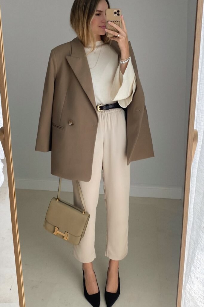 Camel Oversized Blazer + Cream Sweater + Beige Trousers + Black Heels + Beige Crossbody Bag