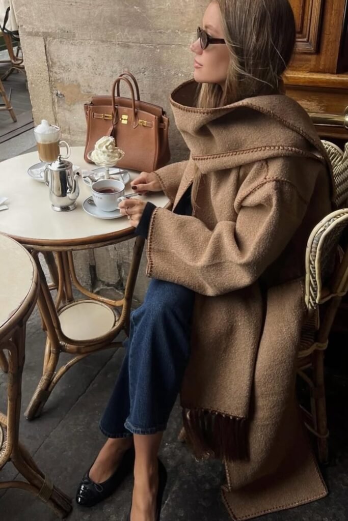 Camel Wool Scarf-Coat with Contrast Stitching + Dark Wash Jeans + Black Patent Flats + Brown Leather Handbag