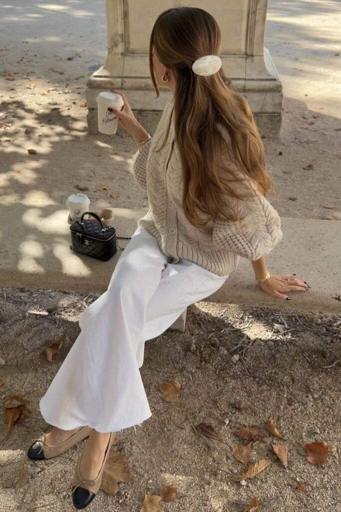 Chunky Beige Cardigan + White Wide-Leg Trousers + Beige and Black Cap-Toe Flats + Chanel Mini Bag