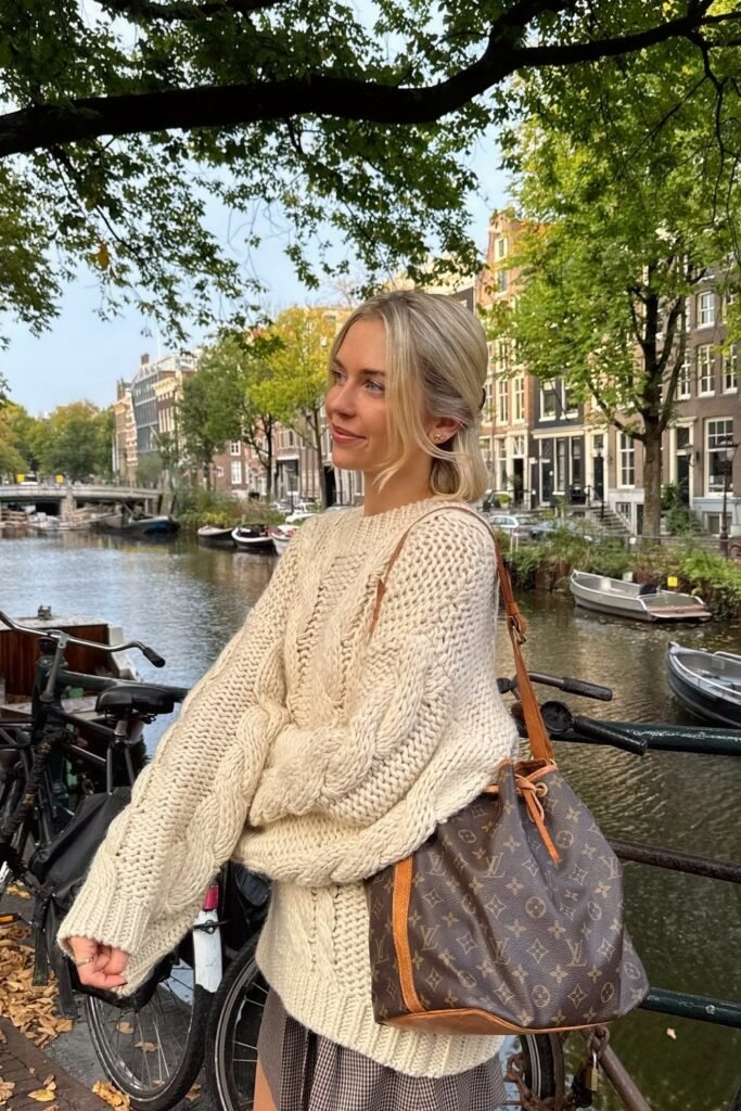 Cream Chunky Cable Knit Sweater + Brown Plaid Skirt/Shorts + Louis Vuitton Bucket Bag