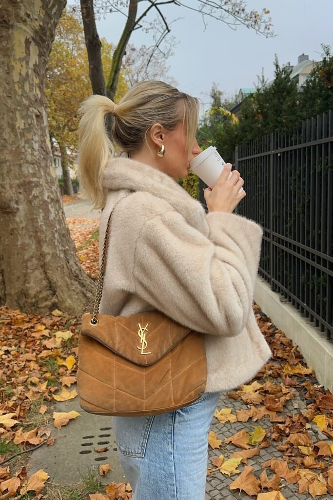 Cream Faux Fur Jacket + Light Wash Straight-Leg Jeans + Tan Suede Quilted Bag + Gold Hoop Earrings