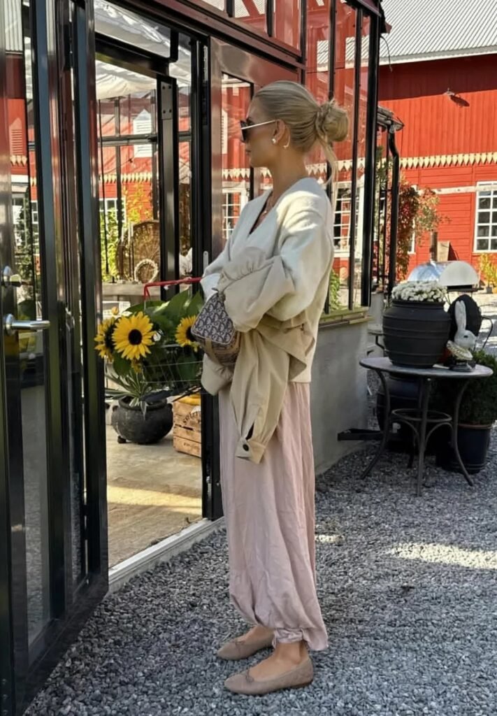 Cream Wrap Top + Pink Wide-Leg Trousers + Nude Flats + Patterned Bag