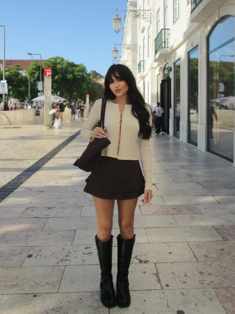 Cream Zip-Up Cardigan + Brown Ruffled Mini Skirt + Black Knee-High Boots + Brown Shoulder Bag