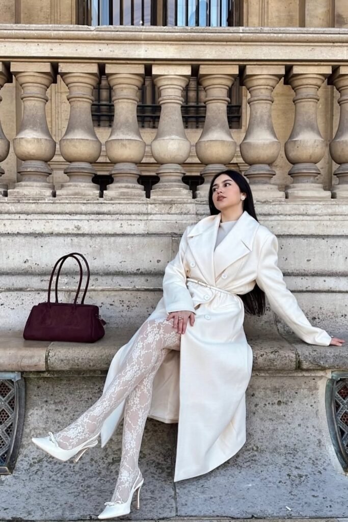 Cream/White Trench Coat + White Lace Tights + White Pointed-Toe Heels + Maroon Shoulder Bag