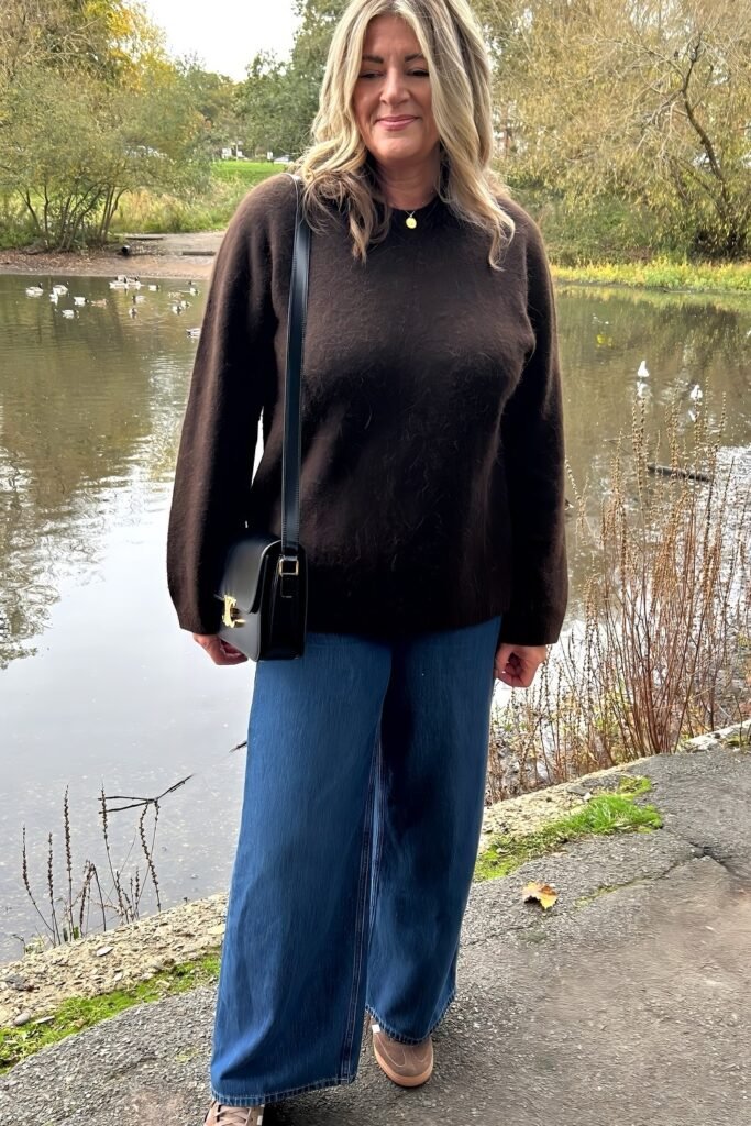 Dark Brown Fuzzy Sweater + Medium Wash Wide Leg Jeans + Tan Sneakers + Black Crossbody Bag