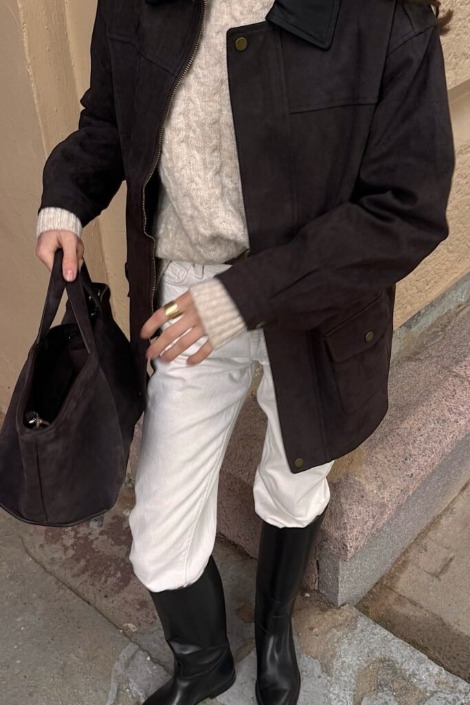 Dark Brown Jacket + Cream Cable Knit Sweater + White Pants + Black Knee-High Boots + Brown Tote Bag