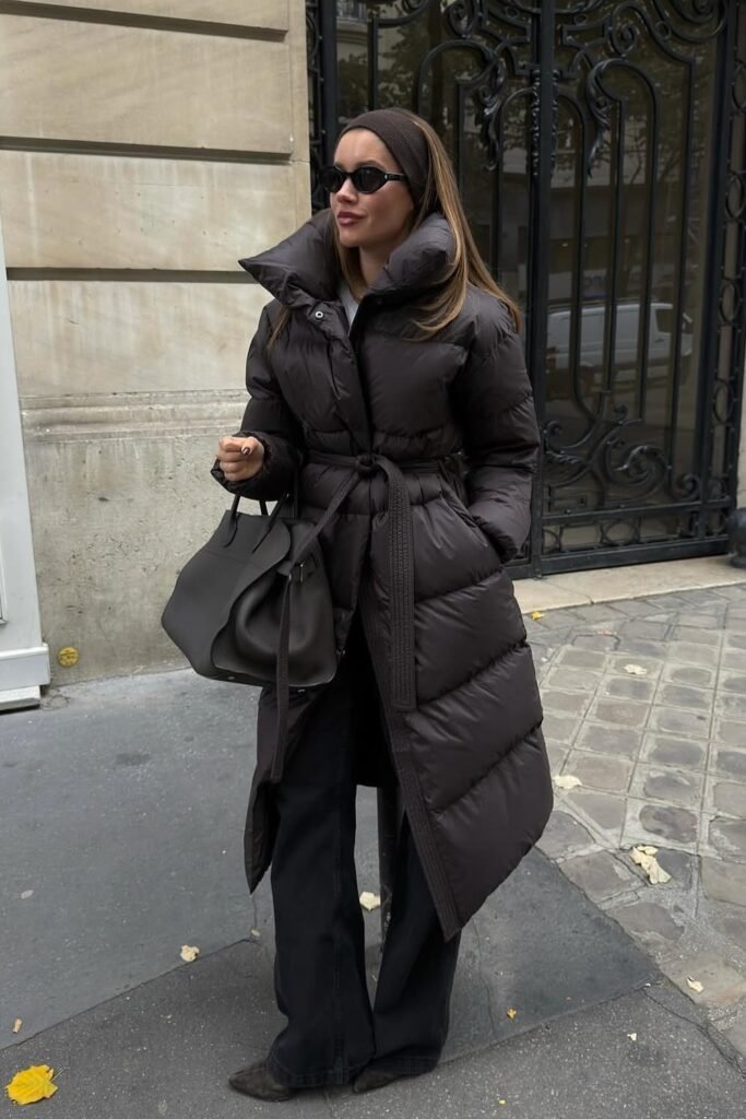 Dark Brown Long Puffer Coat with Belt + Black Wide-Leg Jeans + Dark Grey Tote Bag