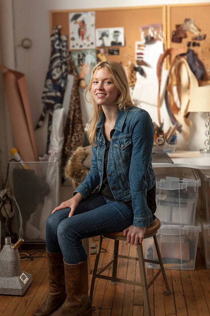 Denim Jacket + Dark Top + Blue Skinny Jeans + Brown Leather Boots