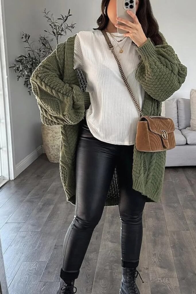 Green Chunky Cable Knit Cardigan + White Ribbed Top + Black Faux Leather Leggings + Black Combat Boots