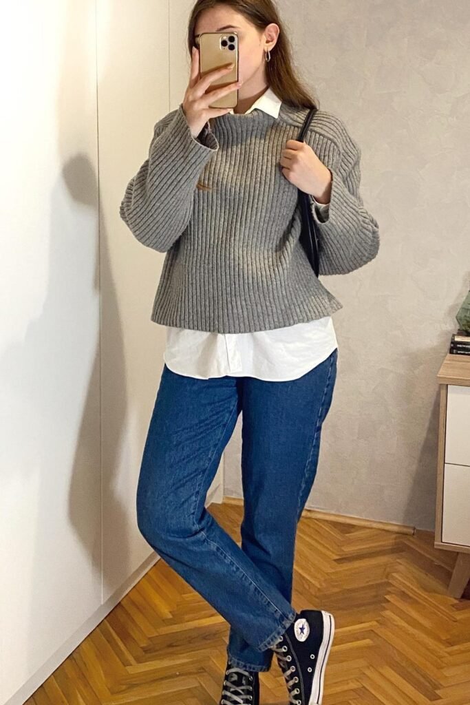Grey Ribbed Sweater with Logo + White Collared Shirt + Blue Mom Jeans + Black Converse Sneakers + Black Shoulder Bag