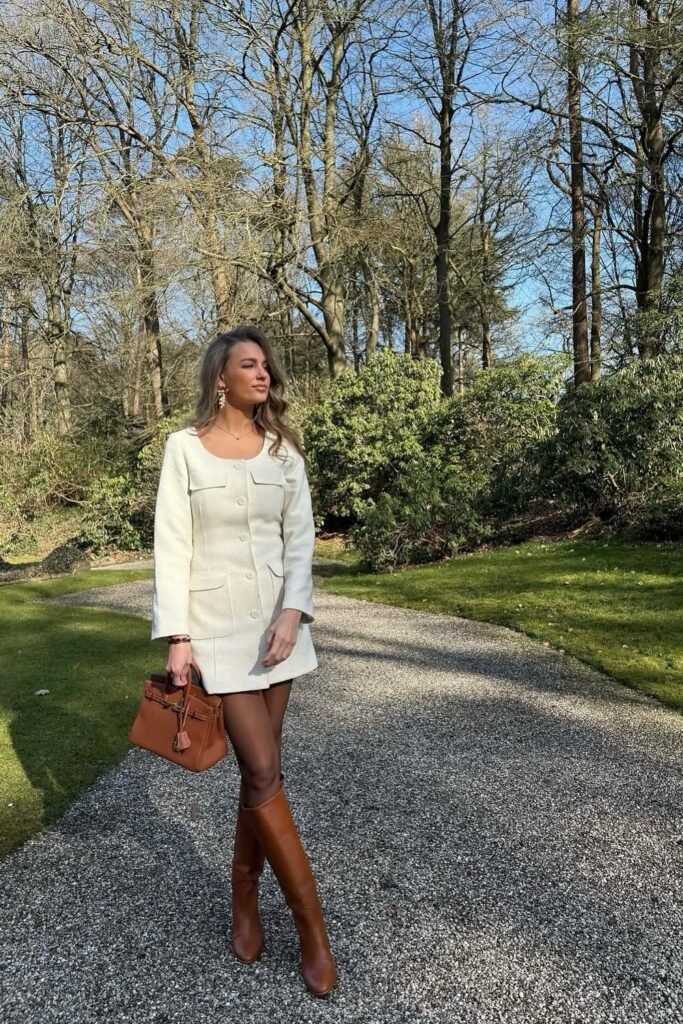 Ivory Long-Sleeve Mini Dress + Brown Knee-High Boots + Brown Structured Handbag