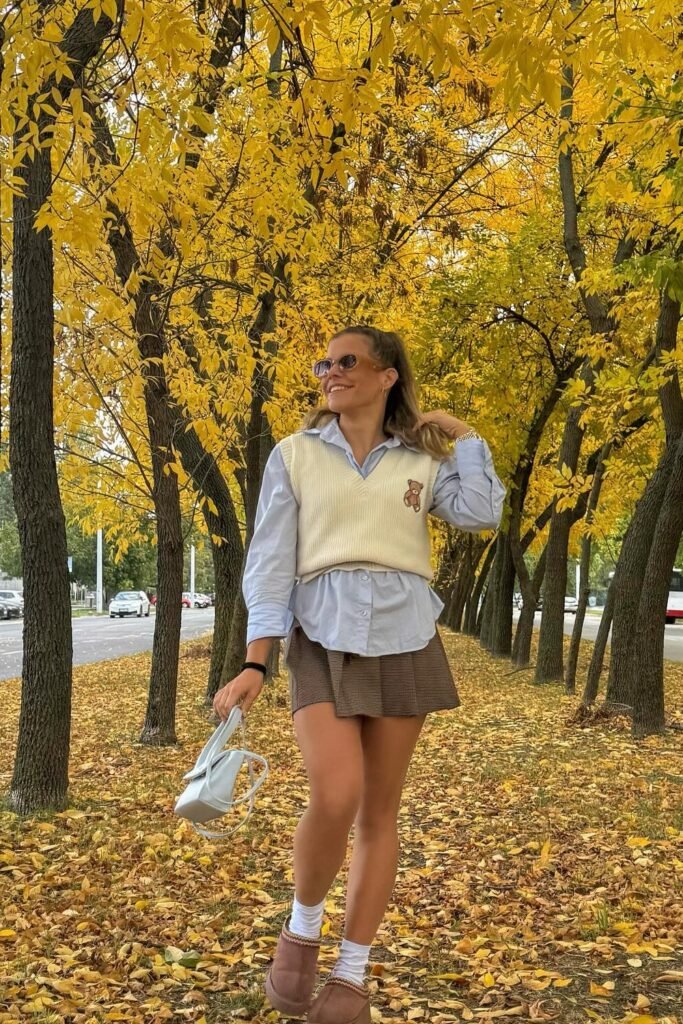 Light Blue Collared Shirt + Cream Teddy Bear Vest + Brown Plaid Mini Skirt + Brown Mules