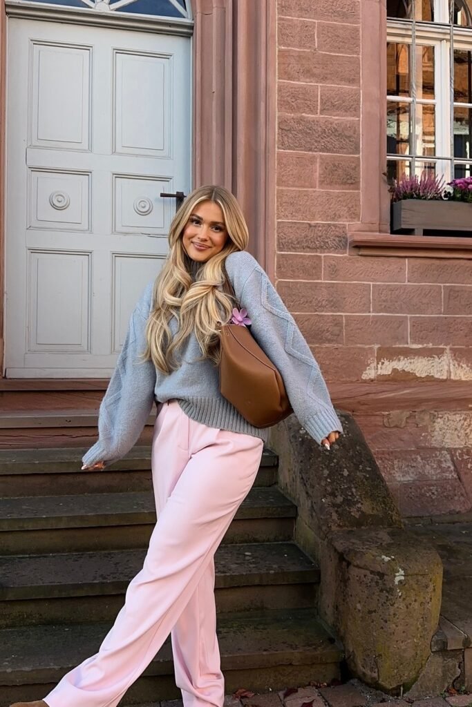 Light Blue Knit Sweater + Pink Straight-Leg Trousers + Brown Shoulder Bag