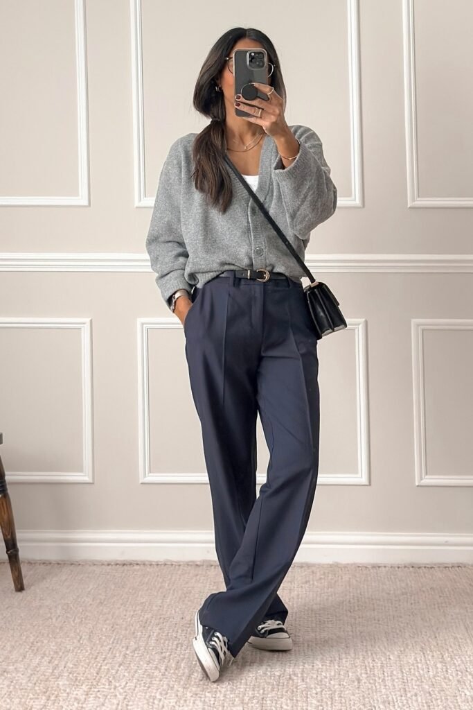 Light Grey Cardigan + White Tank + Navy Trousers + Black Belt + Black Crossbody Bag + Black Sneakers