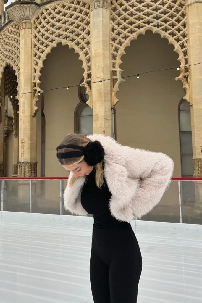 Light Pink Faux Fur Cropped Jacket + Black Bodysuit/Jumpsuit + Black Earmuffs