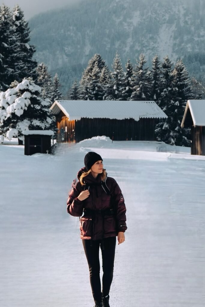 Maroon Cinched Puffer Jacket + Black Leggings + Black Beanie + Backpack