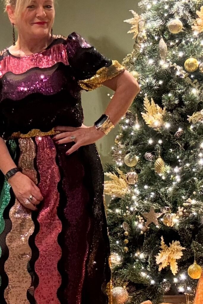 Multi-Colored Sequin Maxi Dress + Gold Cuff Bracelet + Black Watch