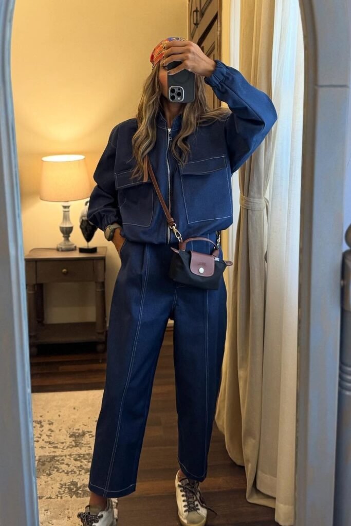 Navy Utility Jacket + Matching Navy High-Waisted Pants + Brown Crossbody Bag + White Sneakers + Printed Headscarf