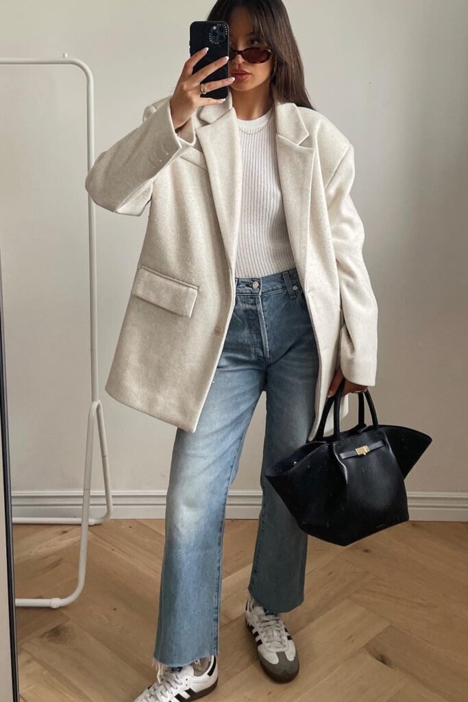 Oatmeal Oversized Blazer + White Ribbed Top + Medium Wash Straight-leg Jeans + White and Black Sneakers