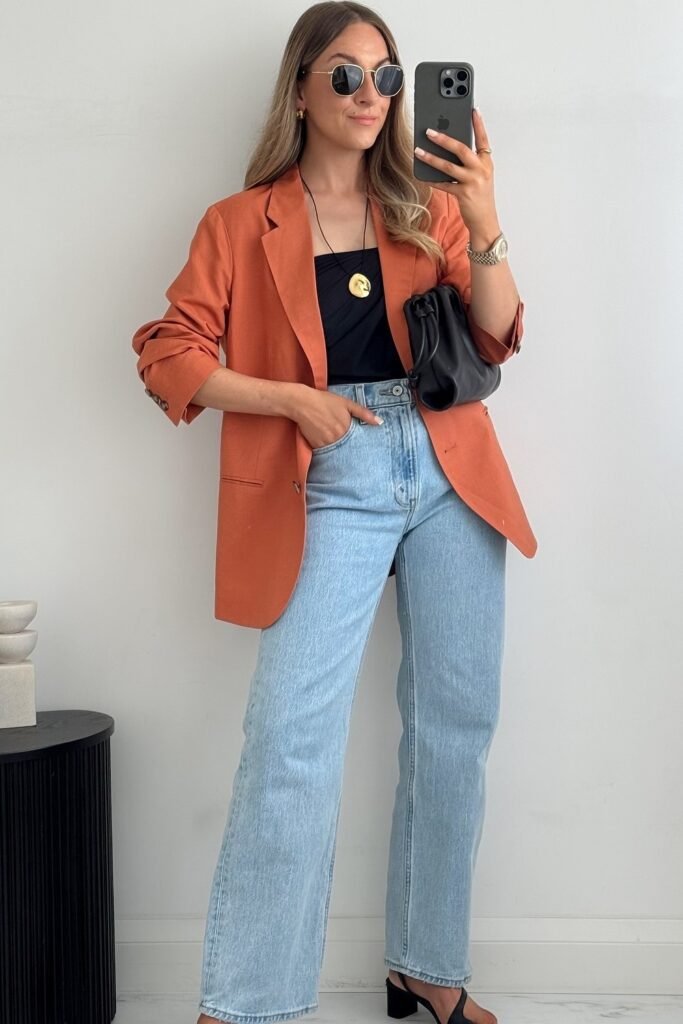 Orange Oversized Blazer + Black Tube Top + Light Wash Straight-leg Jeans + Black Block Heels