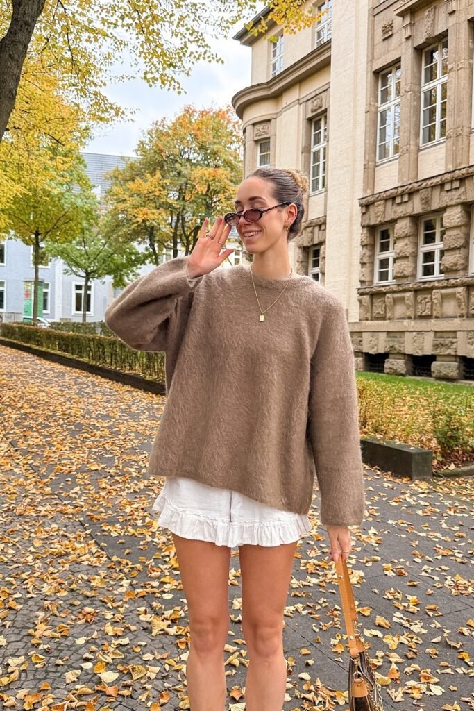 Oversized Brown Fuzzy Sweater + White Ruffled Mini Skirt + Gold Necklace