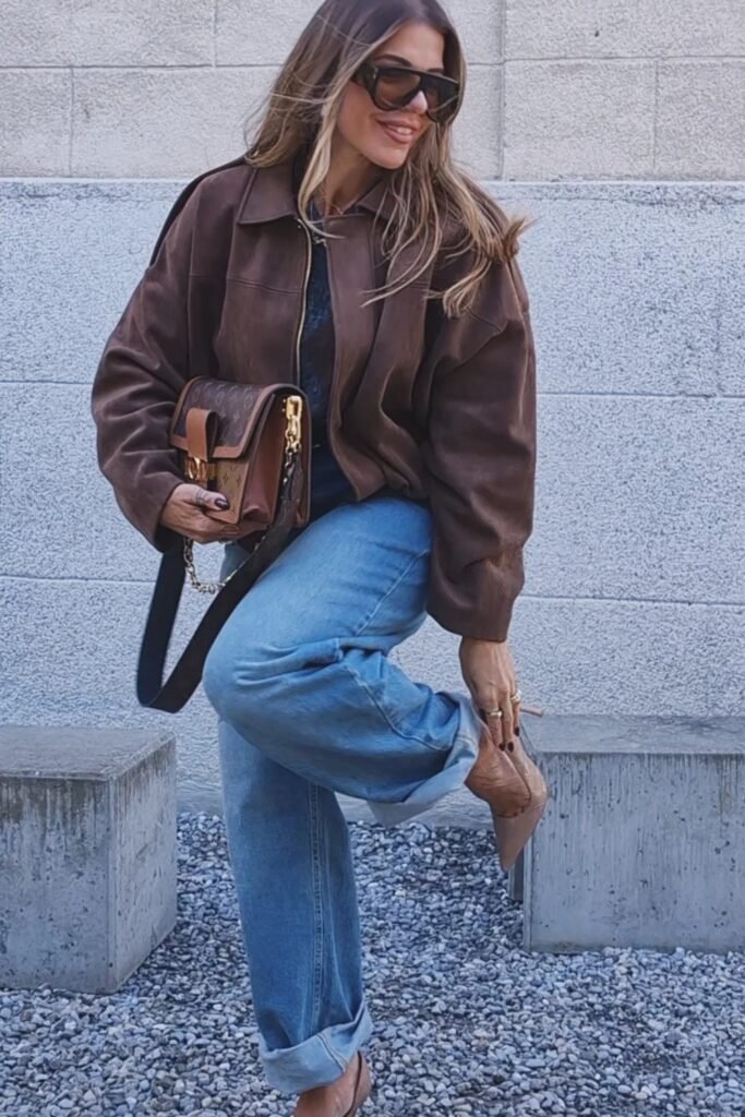 Oversized Brown Suede Jacket + Black Top + Light Blue Wide-Leg Jeans + Brown Heels