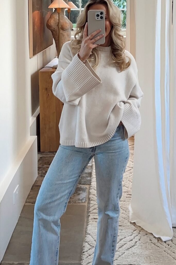 Oversized Cream Sweater + Light Wash Straight-leg Jeans + Beige Ugg-style Boots