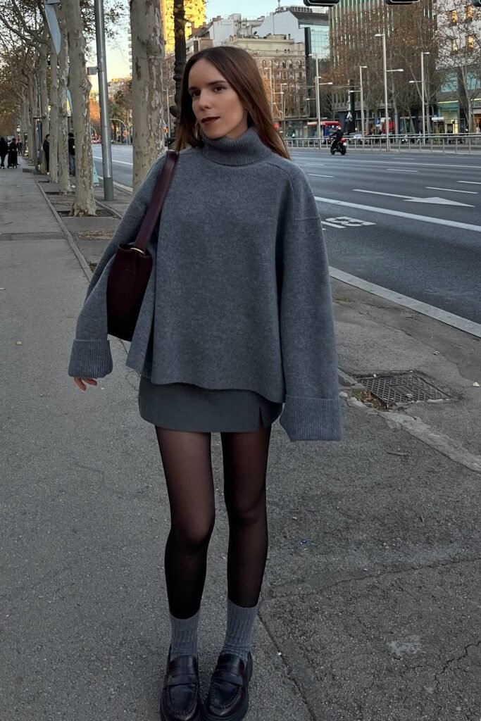 Oversized Grey Turtleneck Sweater + Dark Grey Mini Skirt + Black Tights + Grey Socks + Black Loafers